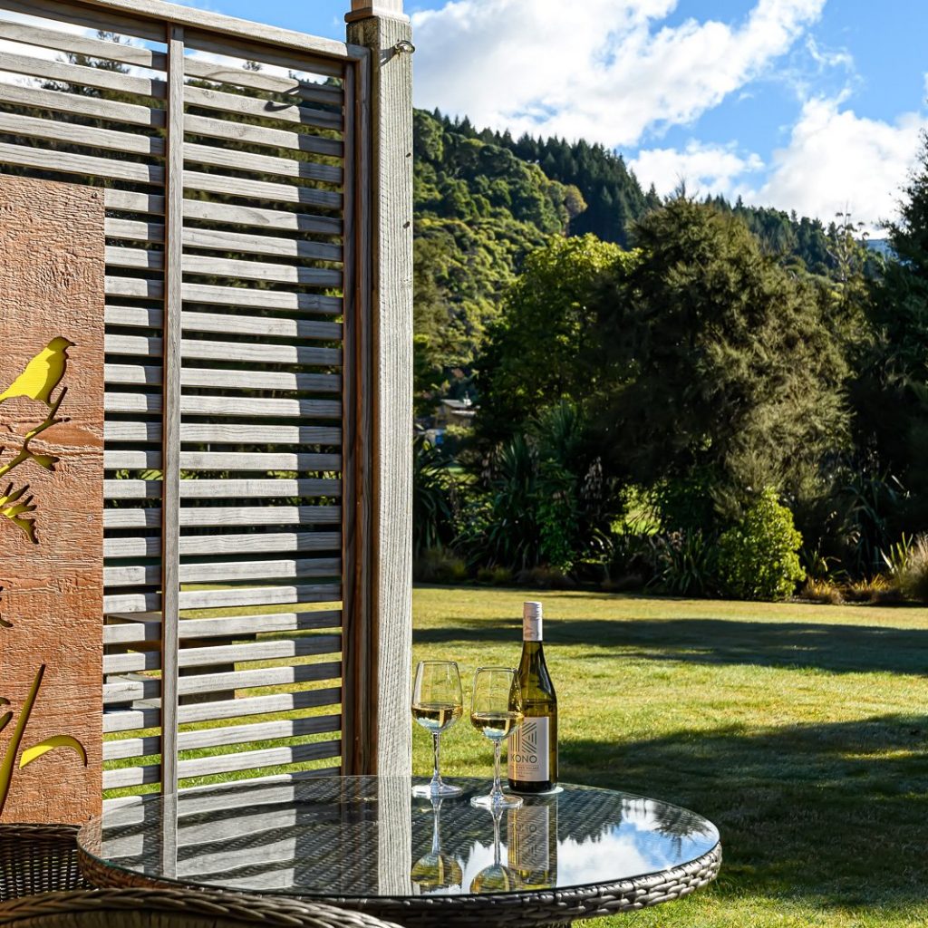 Wine in the Garden at Abel Tasman Lodge